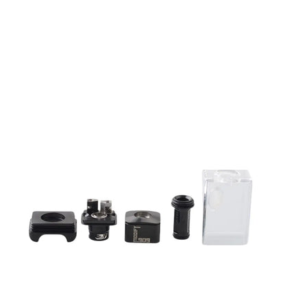 5A Vape Modify 909 Xtra Style RBA components laid out, including the build deck, chimney, base, and clear casing. High-quality rebuildable atomiser for custom vaping setups.