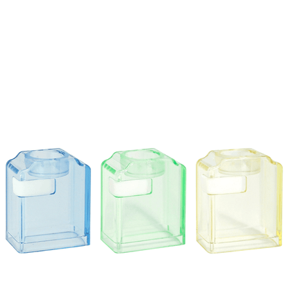 Three transparent vape replacement tanks in blue, green, and yellow.