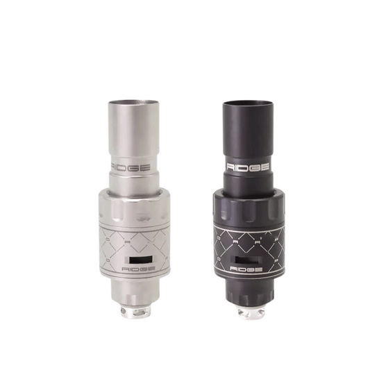 Two SXK Protocol Ridge Style MTL RBA vape tanks, silver and black.