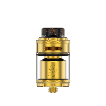 Gold vape tank with clear chamber and black drip tip, featuring a flame logo.